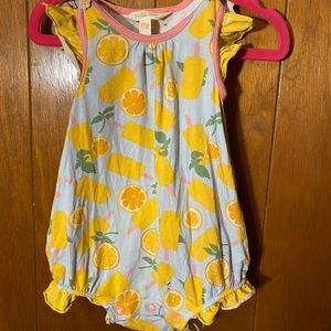 Lemon Bubble, buttons on the shoulders. Cute.